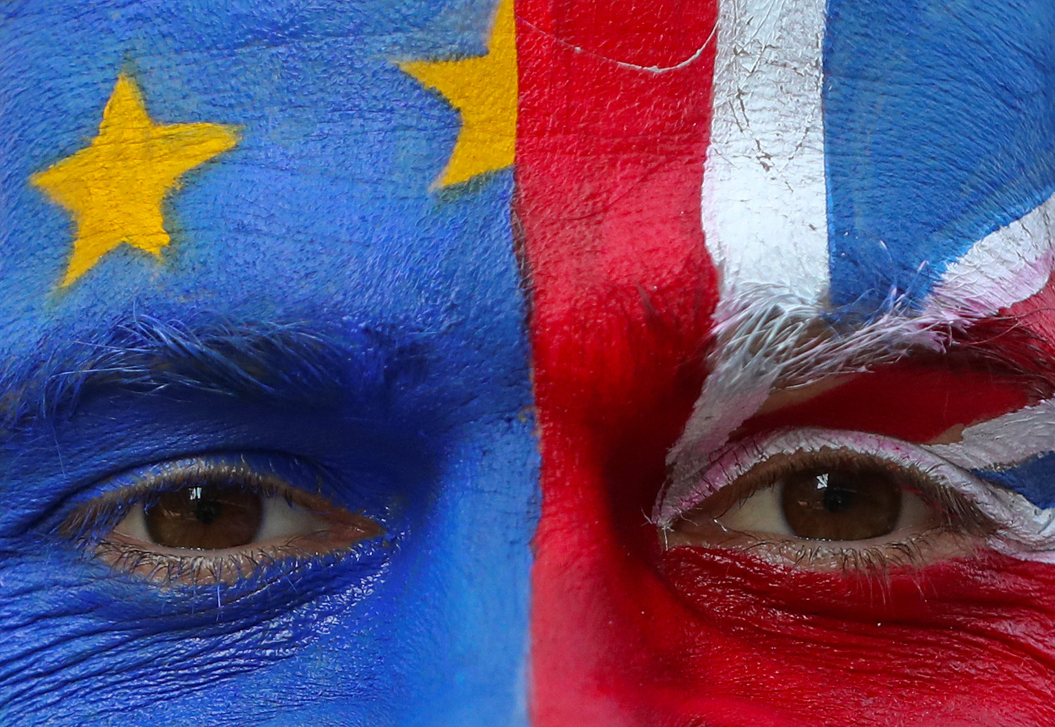 An anti-Brexit protester with painted EU and British flags on his face is seen ahead of a EU Summit in front of European Commission headquarters in Brussels on March 21. Photo: Reuters An anti-Brexit protester with painted EU and British flags on his face is seen ahead of a EU Summit in front of European Commission headquarters in Brussels on March 21. Photo: Reuters