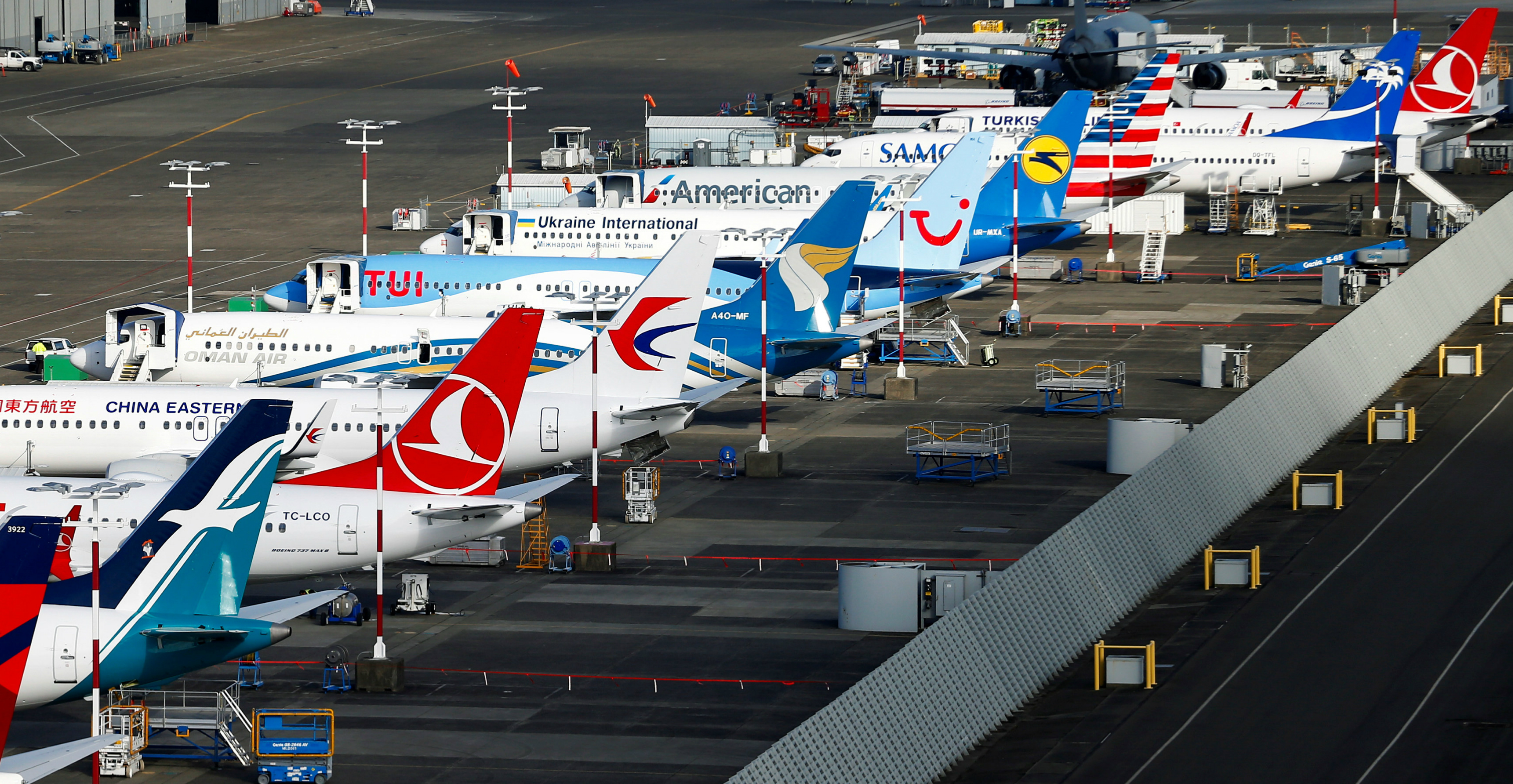 Boeing 737 MAX planes from various airlines are grounded at Boeing Field in Seattle, Washington, on Thursday. Photo: Reuters Boeing 737 MAX planes from various airlines are grounded at Boeing Field in Seattle, Washington, on Thursday. Photo: Reuters