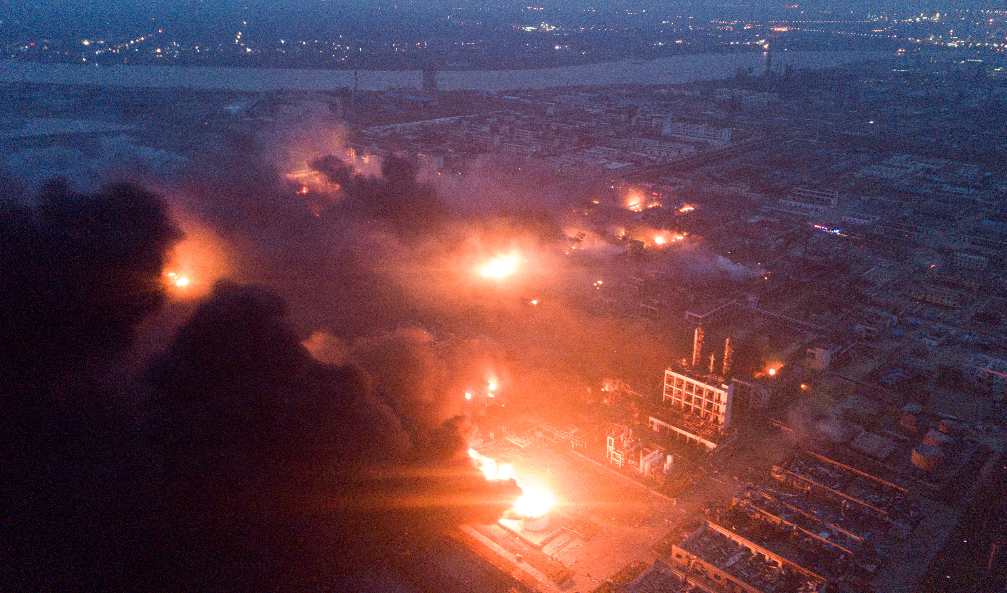 Smoke billows from fire following an explosion at a pesticide plant of Tianjiayi Chemical in Yancheng in China’s Jiangsu province on Thursday. Photo: Reuters Smoke billows from fire following an explosion at a pesticide plant of Tianjiayi Chemical in Yancheng in China’s Jiangsu province on Thursday. Photo: Reuters