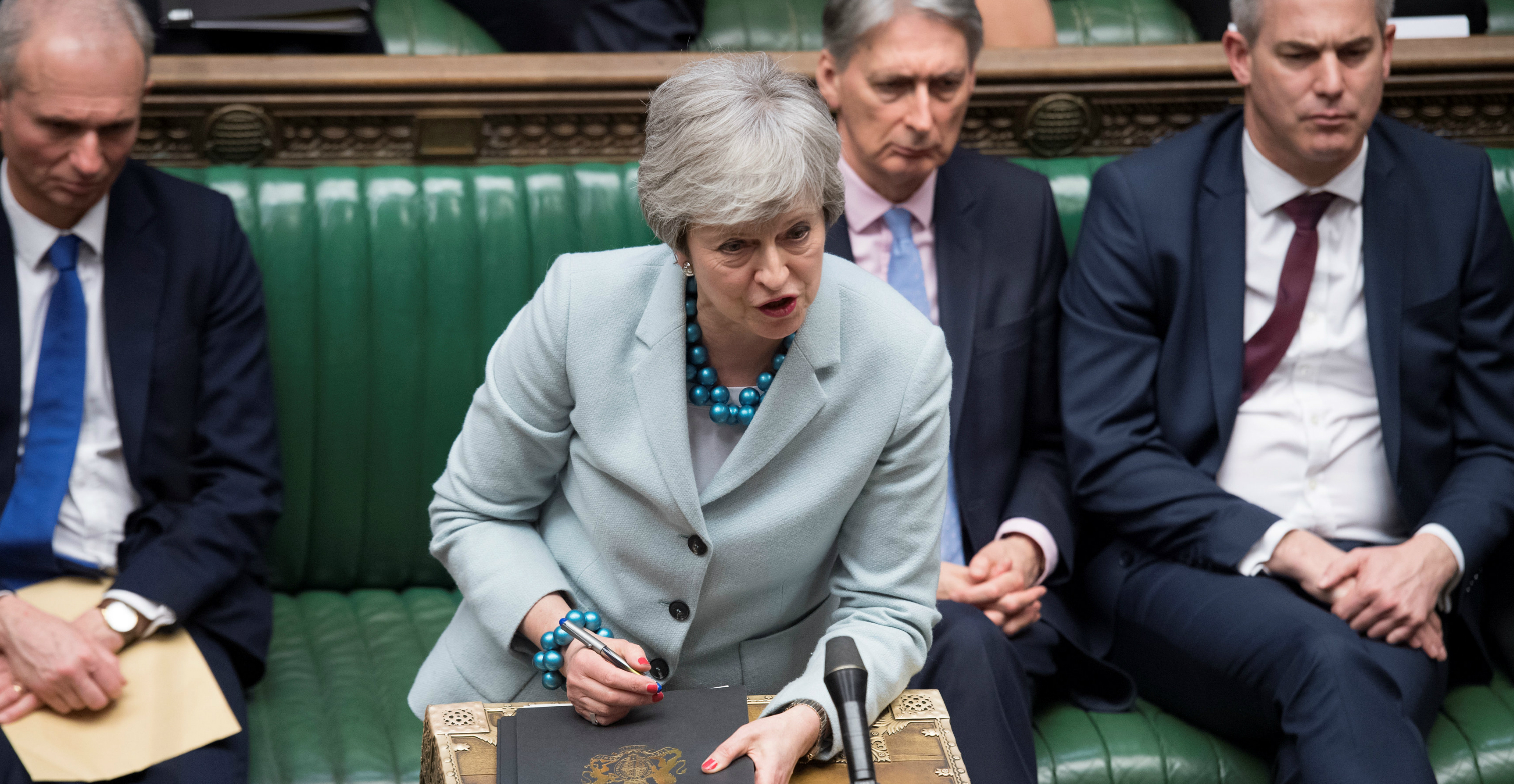 British Prime Minister Theresa May speaks in Parliament in London on Monday. Photo: Handout via Reuters British Prime Minister Theresa May speaks in Parliament in London on Monday. Photo: Handout via Reuters