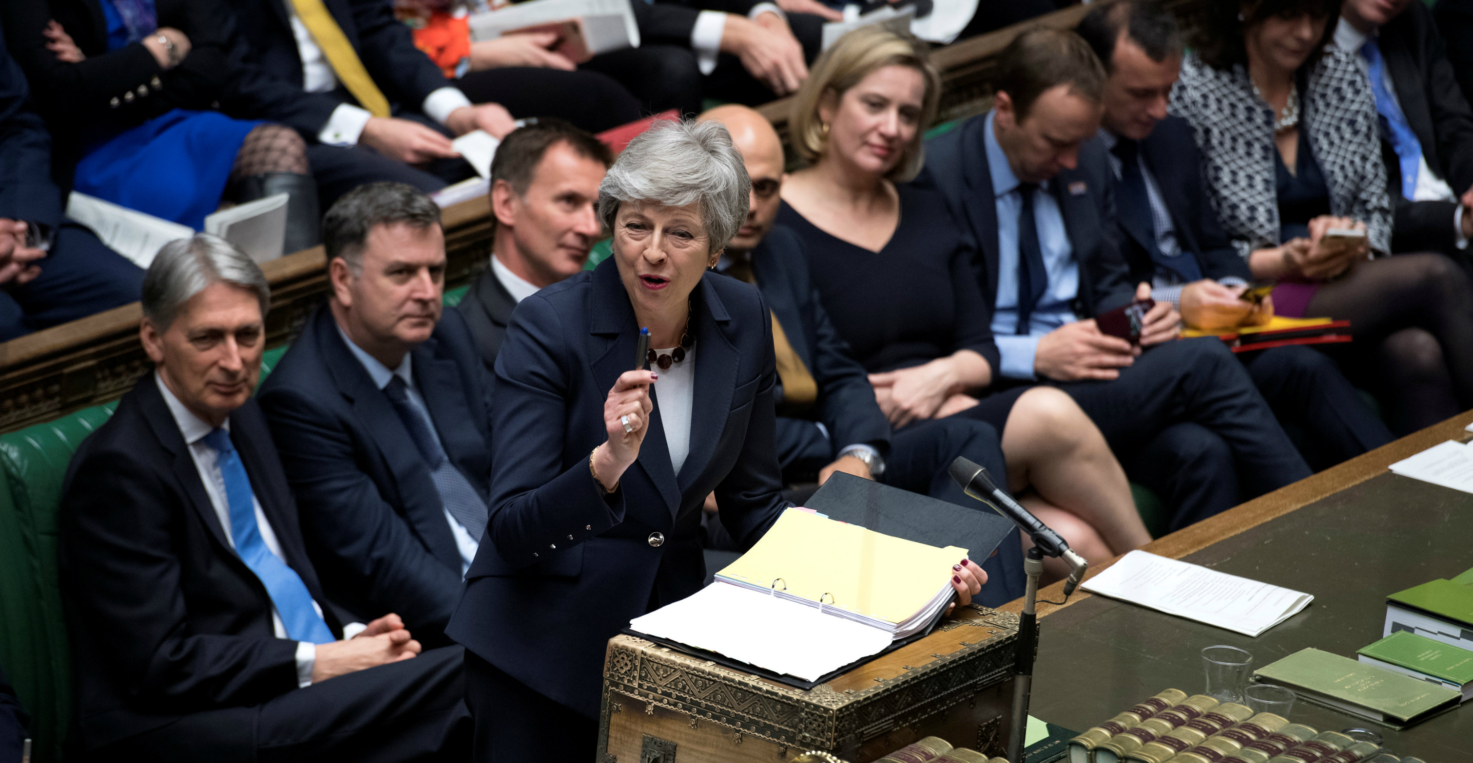 British Prime Minister Theresa May speaks at the House of Commons in London on Wednesday. Photo: Handout via Reuters British Prime Minister Theresa May speaks at the House of Commons in London on Wednesday. Photo: Handout via Reuters