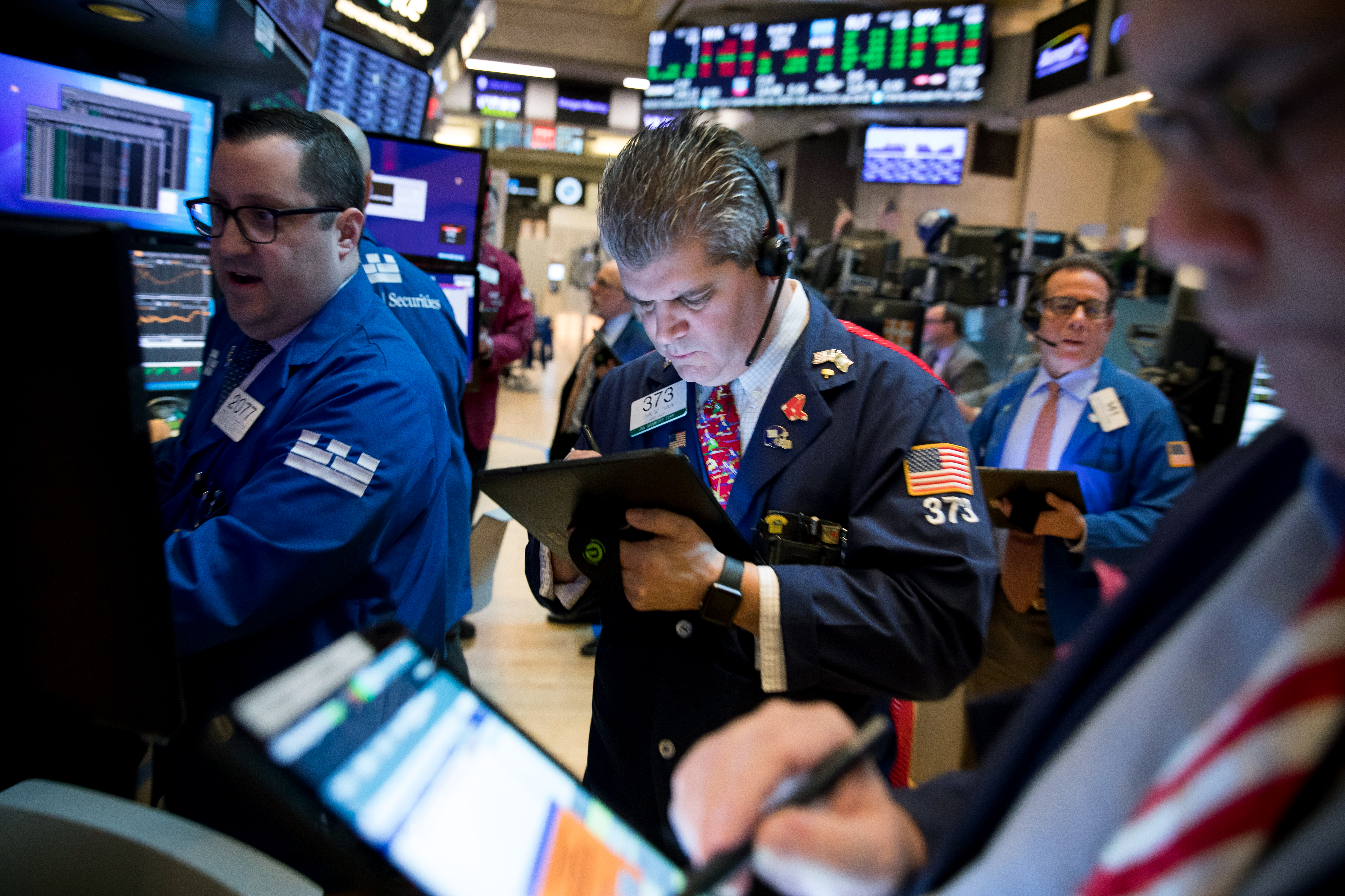 Traders work on the floor of the New York Stock Exchange in this picture taken on April 5. Markets have priced in many positive factors, but ‘risk-off’ sentiment could make a comeback down the road, Nouriel Roubini warns. Photo: Bloomberg Traders work on the floor of the New York Stock Exchange in this picture taken on April 5. Markets have priced in many positive factors, but ‘risk-off’ sentiment could make a comeback down the road, Nouriel Roubini warns. Photo: Bloomberg