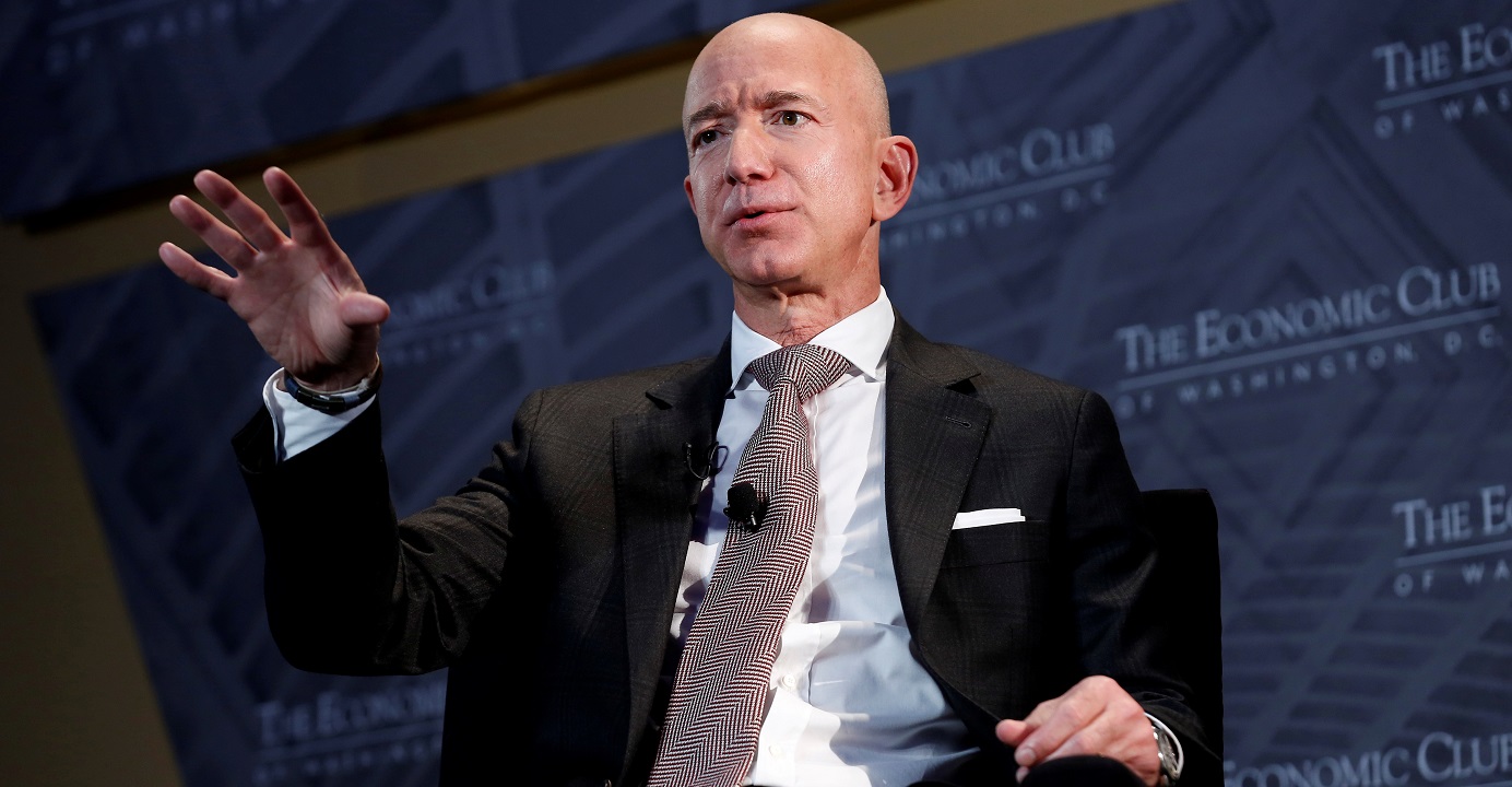 Jeff Bezos has thrown a challenge at other big retailers about matching the pay and benefits that Amazon is offering to its workers, saying he is ready to boost the hourly wage further if the others step up their game. Photo: Reuters Jeff Bezos has thrown a challenge at other big retailers about matching the pay and benefits that Amazon is offering to its workers, saying he is ready to boost the hourly wage further if the others step up their game. Photo: Reuters