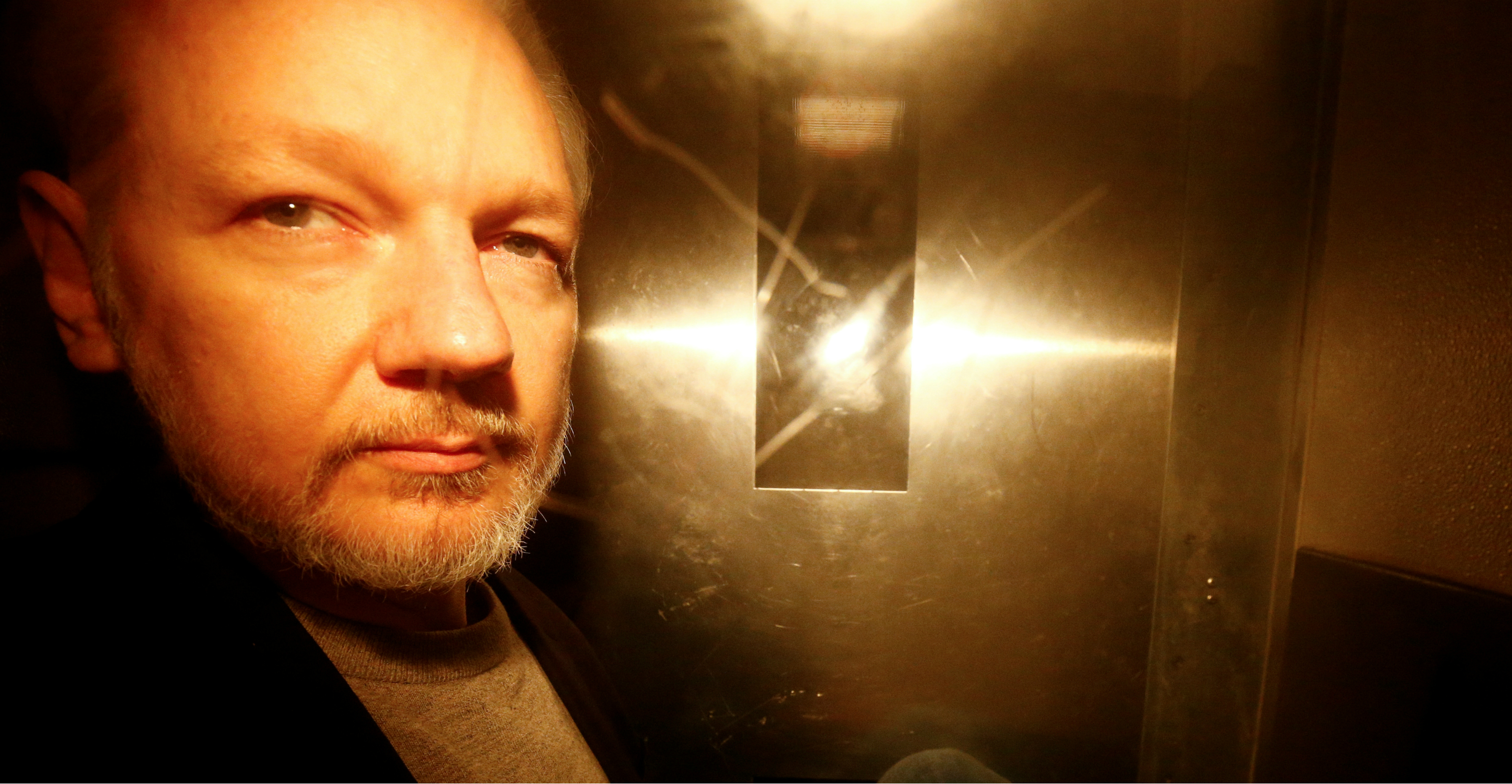 WikiLeaks founder Julian Assange leaves Southwark Crown Court after being sentenced in London on Wednesday. Photo: Reuters WikiLeaks founder Julian Assange leaves Southwark Crown Court after being sentenced in London on Wednesday. Photo: Reuters