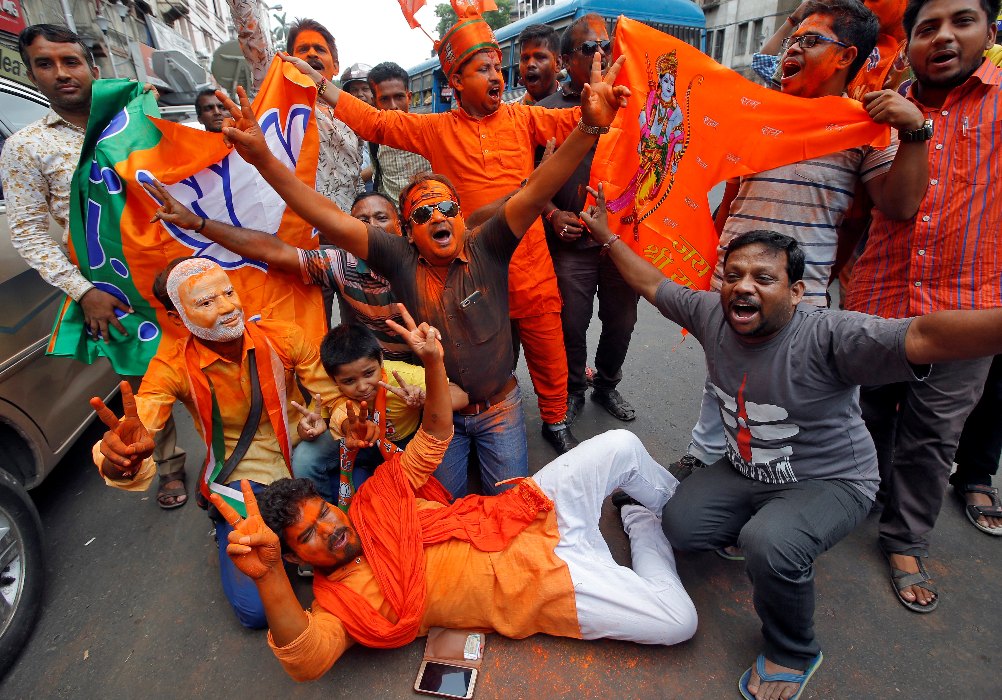 Supporters of Narendra Modi's Bharatiya Janata Party (BJP) celebrate after the party's landslide victory in India's federal election. Photo: Reuters Supporters of Narendra Modi's Bharatiya Janata Party (BJP) celebrate after the party's landslide victory in India's federal election. Photo: Reuters
