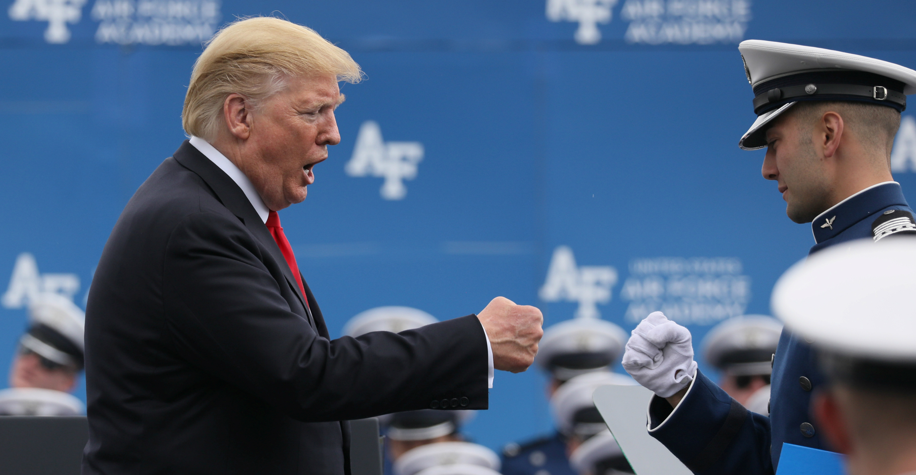 US President Donald Trump fist-bumps a graduating cadet at the US Air Force Academy's graduation ceremony in Colorado Springs, Colorado, on Thursday. Photo: Reuters US President Donald Trump fist-bumps a graduating cadet at the US Air Force Academy's graduation ceremony in Colorado Springs, Colorado, on Thursday. Photo: Reuters