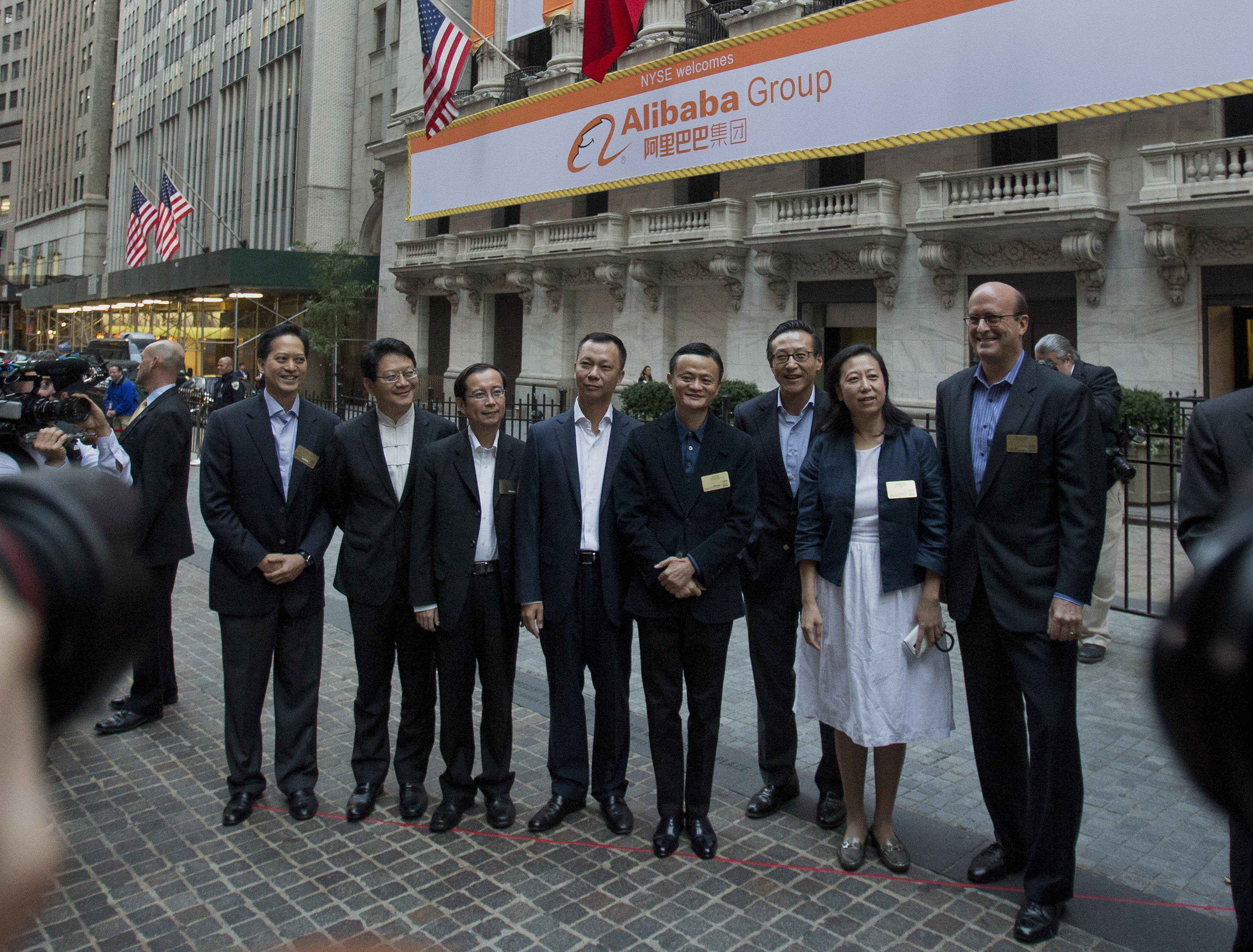 A file picture shows CFO Maggie Wu (2nd from right) with other top Alibaba executives in front of the New York Stock Exchange on Sept 19, 2014 after the firm’s listing. Wu has now been given added responsibilities within the group. Photo: Bloomberg A file picture shows CFO Maggie Wu (2nd from right) with other top Alibaba executives in front of the New York Stock Exchange on Sept 19, 2014 after the firm’s listing. Wu has now been given added responsibilities within the group. Photo: Bloomberg