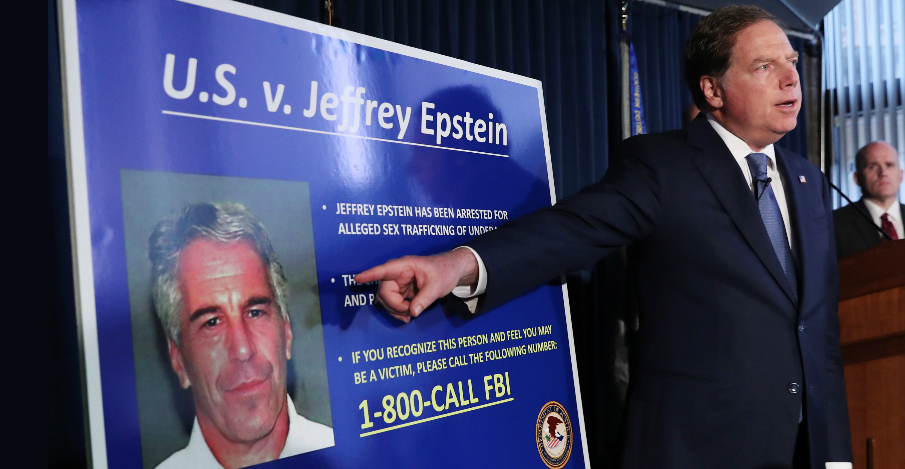 Geoffrey Berman, US attorney for the Southern District of New York, points to a photograph of Jeffrey Epstein as he announces the filing of charges against the financier on Monday. Photo: Reuters Geoffrey Berman, US attorney for the Southern District of New York, points to a photograph of Jeffrey Epstein as he announces the filing of charges against the financier on Monday. Photo: Reuters