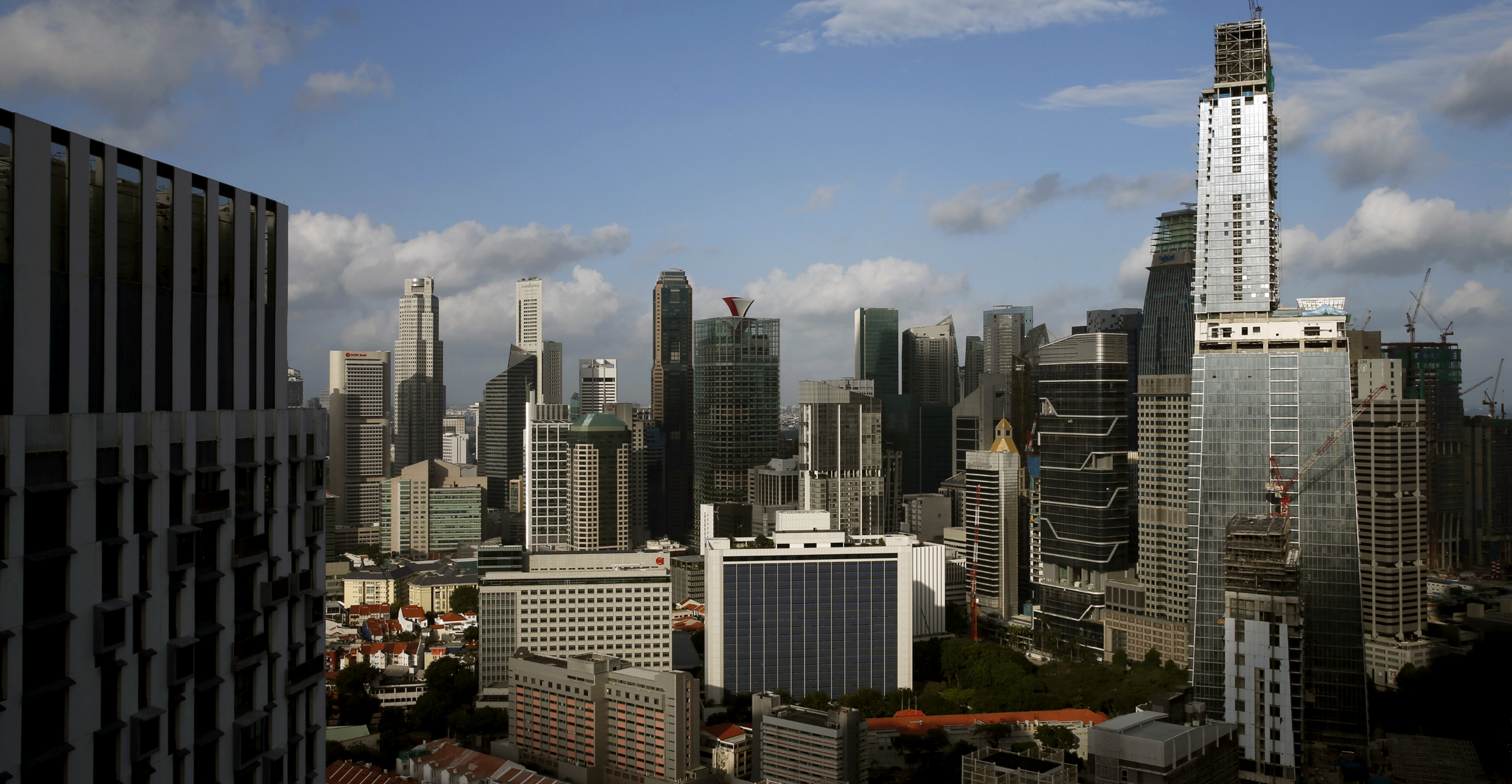 James Dyson bought the three-storey penthouse at the top of Singapore’s tallest building, Tanjong Pagar Centre (right), for S$73.8 million (US$54.2 million). Photo: Reuters James Dyson bought the three-storey penthouse at the top of Singapore’s tallest building, Tanjong Pagar Centre (right), for S$73.8 million (US$54.2 million). Photo: Reuters