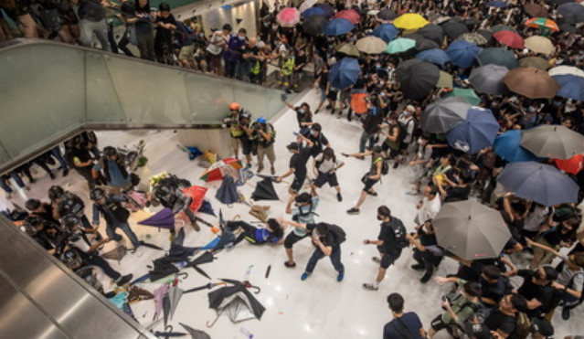 While protest marches are still peaceful, they are often followed by clashes between protesters and the police, usually leading to injuries on both sides. Photo: Bloomberg While protest marches are still peaceful, they are often followed by clashes between protesters and the police, usually leading to injuries on both sides. Photo: Bloomberg