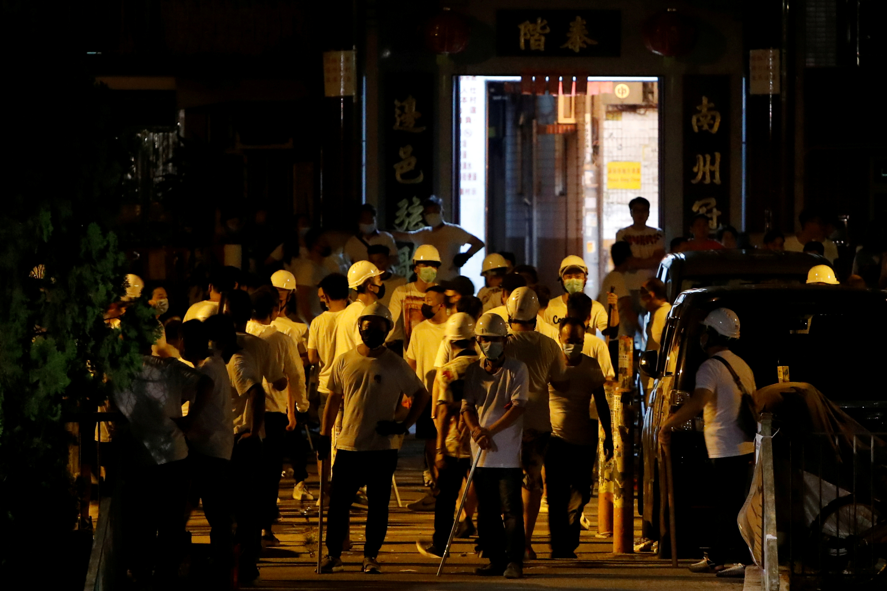 Following the violence unleashed by white-clad thugs in Yuen Long last Sunday, the New Territories town is bracing for further potential trouble. Photo: Reuters Following the violence unleashed by white-clad thugs in Yuen Long last Sunday, the New Territories town is bracing for further potential trouble. Photo: Reuters