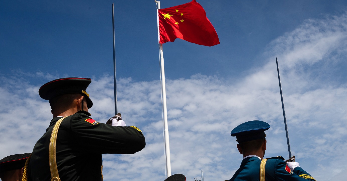 A flag-raising ceremony at the PLA Barracks on Stonecutters Island. China's defense ministry said the military may be deployed to help maintain public order in Hong Kong upon the request of the SAR government. Photo: Bloomberg A flag-raising ceremony at the PLA Barracks on Stonecutters Island. China's defense ministry said the military may be deployed to help maintain public order in Hong Kong upon the request of the SAR government. Photo: Bloomberg