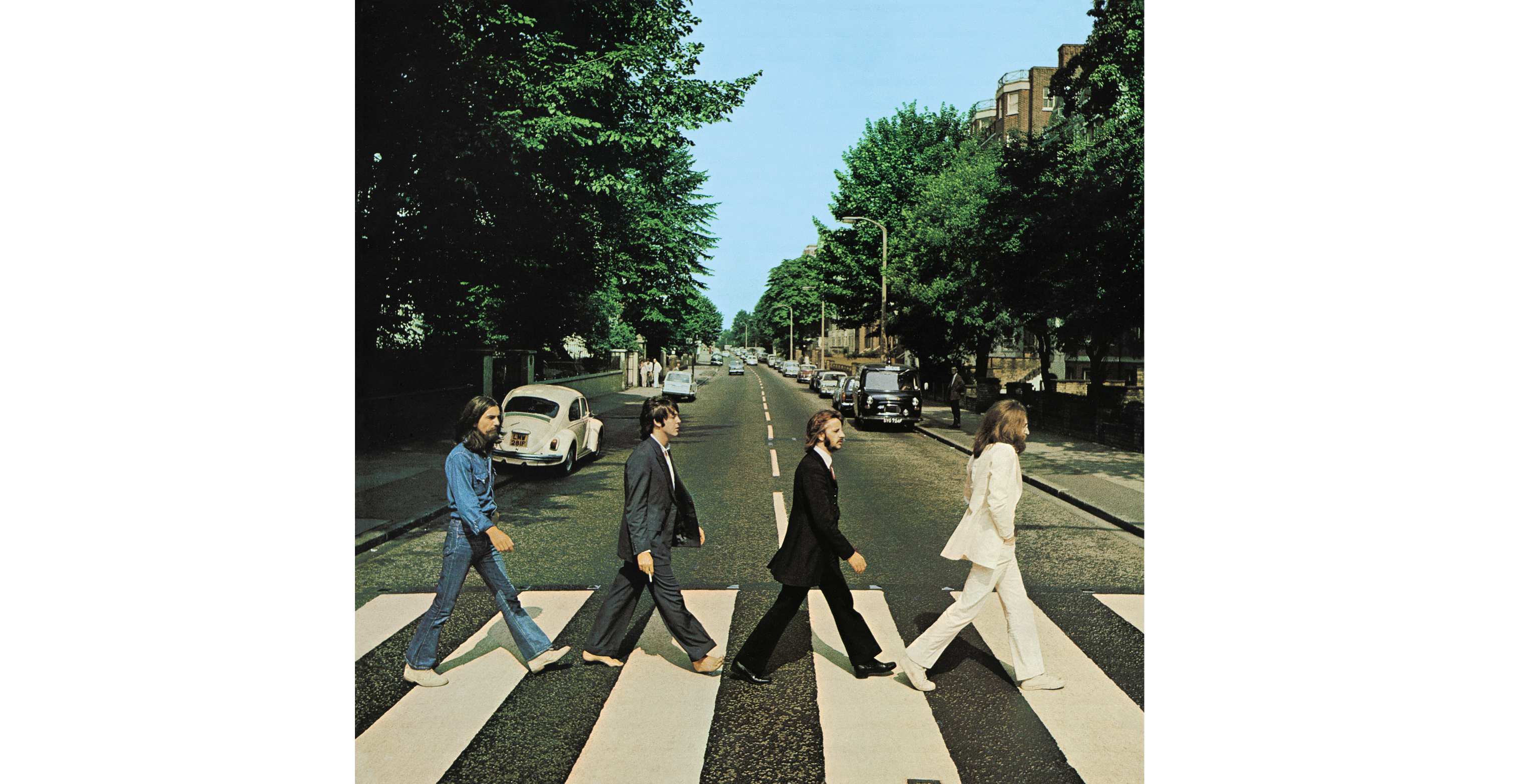 Members of the Beatles – George Harrison, Paul McCartney, Ringo Starr, and John Lennon, – cross Abbey Road in London on August 8, 1969. Photo: Iain Macmillan, courtesy Apple Corps via Reuters Members of the Beatles – George Harrison, Paul McCartney, Ringo Starr, and John Lennon, – cross Abbey Road in London on August 8, 1969. Photo: Iain Macmillan, courtesy Apple Corps via Reuters