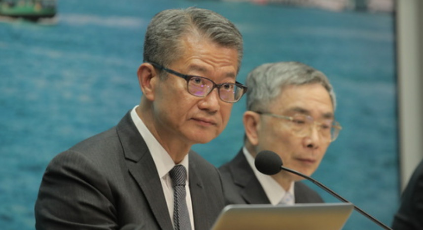 Hong Kong's Financial Secretary Paul Chan speaks at a press conference on Aug. 15 while announcing measures to help businesses and households weather the economic challenges. Photo: HKEJ Hong Kong's Financial Secretary Paul Chan speaks at a press conference on Aug. 15 while announcing measures to help businesses and households weather the economic challenges. Photo: HKEJ