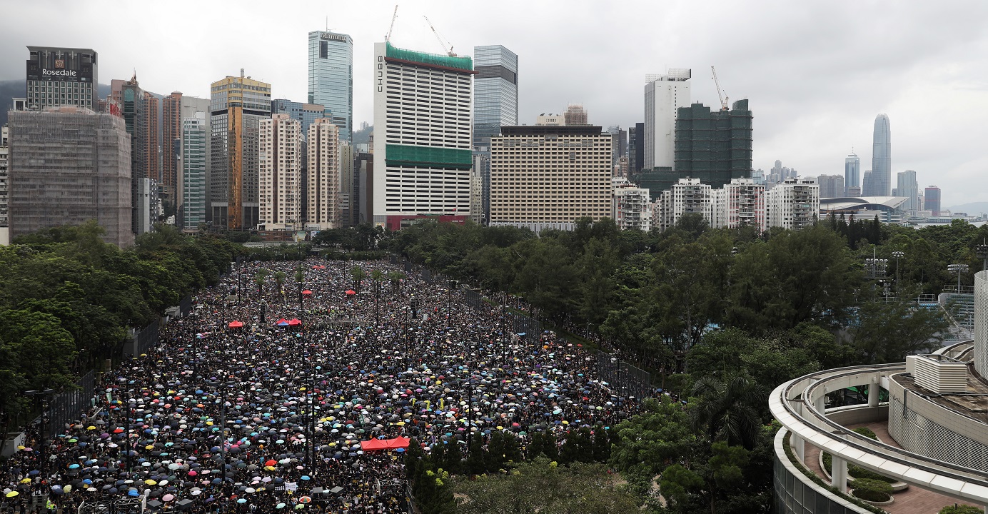 People gather at Victoria Park for a mass demonstration in Hong Kong on Aug. 18. Given the tense political and social atmosphere, rebuilding trust in the government won’t be easy. Photo: Bloomberg People gather at Victoria Park for a mass demonstration in Hong Kong on Aug. 18. Given the tense political and social atmosphere, rebuilding trust in the government won’t be easy. Photo: Bloomberg