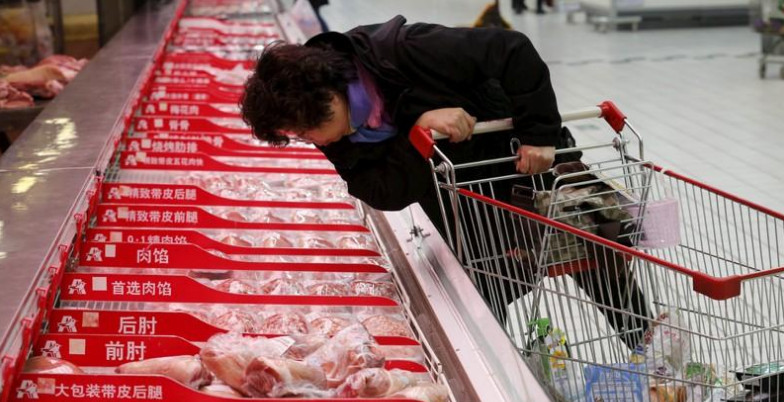 Chinese consumers have been bit by rising pork prices and a softer economy. Photo: Reuters Chinese consumers have been bit by rising pork prices and a softer economy. Photo: Reuters