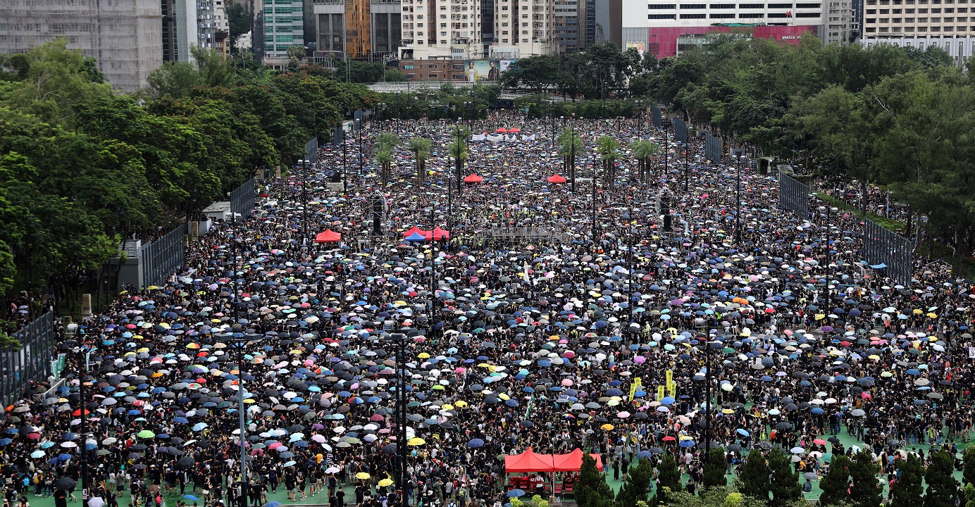 Protesters gather at Victoria Park in Causeway Bay on Aug. 18. Apart from responding to the people's five demands, the government should also give detailed explanations about several incidents involving the police. Photo: Bloomberg Protesters gather at Victoria Park in Causeway Bay on Aug. 18. Apart from responding to the people's five demands, the government should also give detailed explanations about several incidents involving the police. Photo: Bloomberg