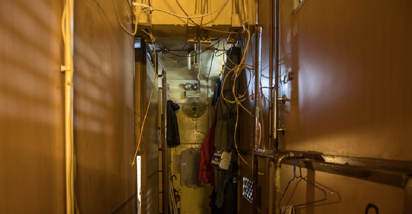 A file picture shows subdivided residential units lining a corridor inside a building in Hong Kong. People staying in such units often face exploitation by the landlords, a study has found. Photo: Bloomberg A file picture shows subdivided residential units lining a corridor inside a building in Hong Kong. People staying in such units often face exploitation by the landlords, a study has found. Photo: Bloomberg