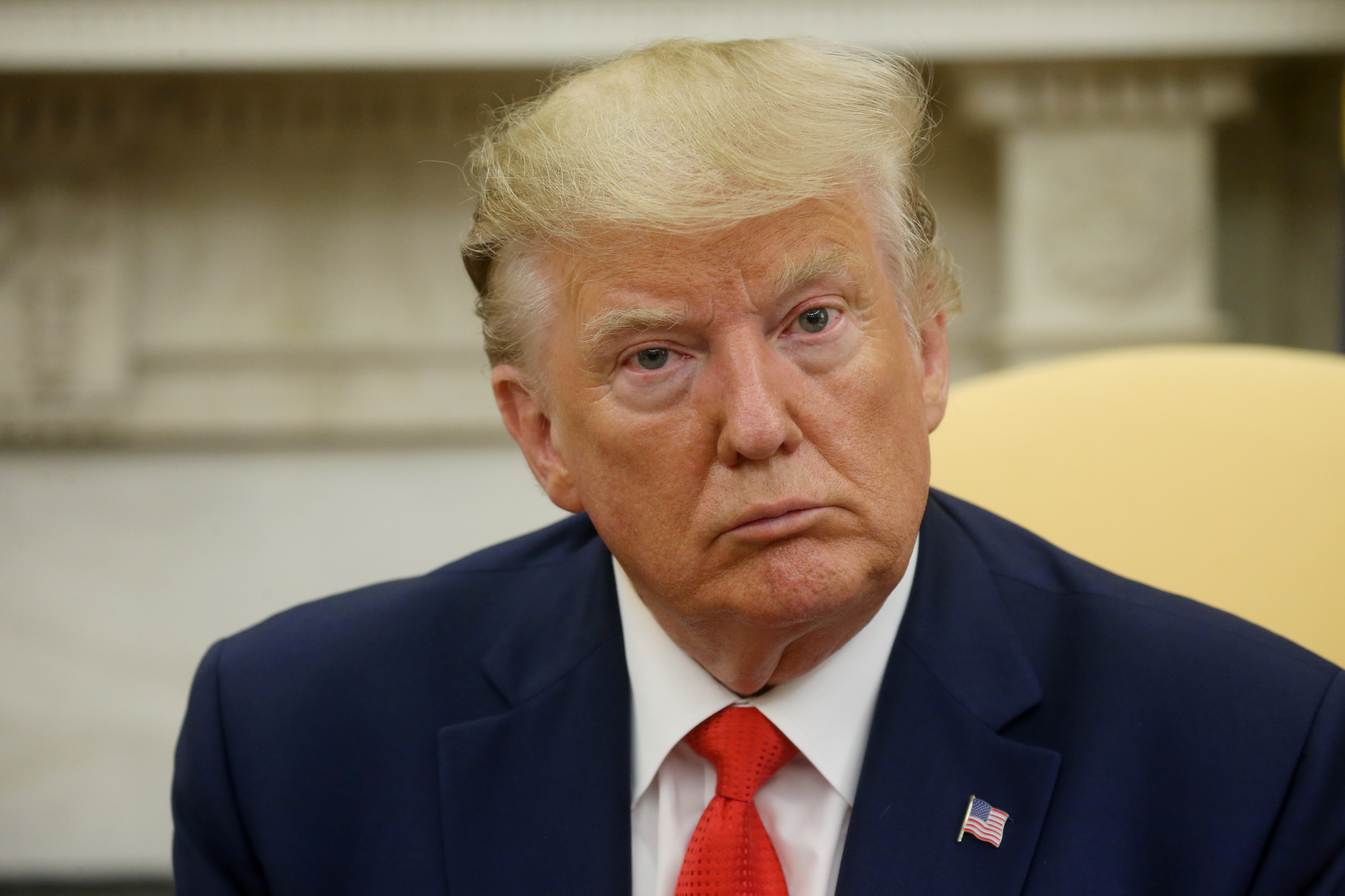 Donald Trump answers questions from the news media in the Oval Office of the White House in Washington on Wednesday. Photo: Reuters Donald Trump answers questions from the news media in the Oval Office of the White House in Washington on Wednesday. Photo: Reuters