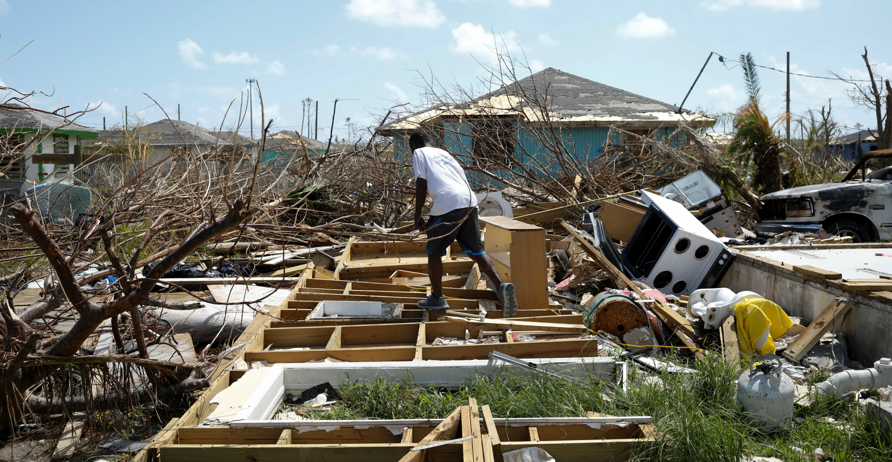A man inspects what is left of his house on Wednesday, after Hurricane Dorian hit the Abaco Islands in Spring City, Bahamas. Photo: Reuters A man inspects what is left of his house on Wednesday, after Hurricane Dorian hit the Abaco Islands in Spring City, Bahamas. Photo: Reuters