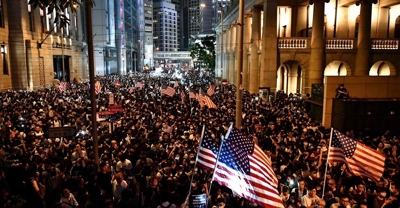 Protesters attend a rally in Central on Monday calling on the US to pass the Hong Kong Human Rights and Democracy Act. The bill was cleared by the US House of Representatives on Tuesday, but needs other approvals before it can become law. Photo: AFP Protesters attend a rally in Central on Monday calling on the US to pass the Hong Kong Human Rights and Democracy Act. The bill was cleared by the US House of Representatives on Tuesday, but needs other approvals before it can become law. Photo: AFP