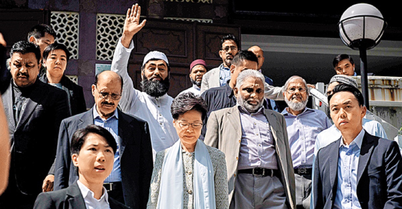 Chief Executive Carrie Lam, accompanied by Police Commissioner Stephen Lo (not in the picture), pays a visit to the Kowloon Mosque in Tsim Sha Tsui on Monday to offer apologies for the water-cannon incident. Photo: AFP Chief Executive Carrie Lam, accompanied by Police Commissioner Stephen Lo (not in the picture), pays a visit to the Kowloon Mosque in Tsim Sha Tsui on Monday to offer apologies for the water-cannon incident. Photo: AFP