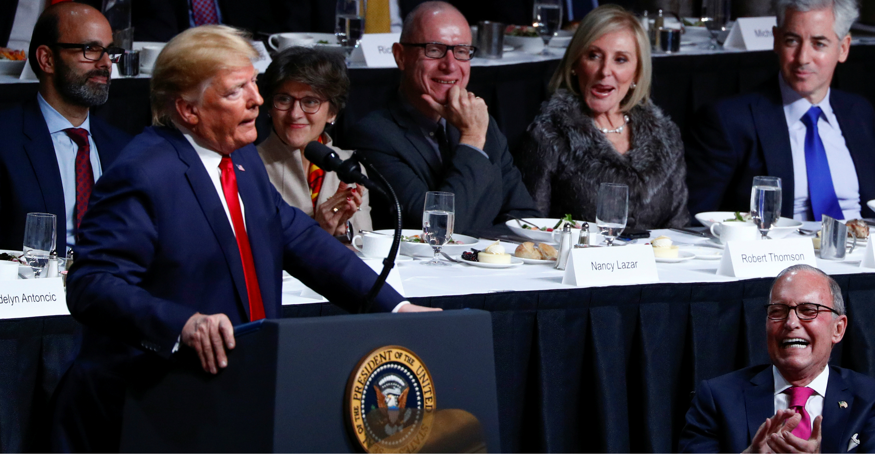White House economic adviser Larry Kudlow (bottom right) laughs as US President Donald Trump makes a joke during his remarks at the Economic Club of New York at the Hilton Midtown Hotel in Manhattan on Tuesday. Photo: Reuters White House economic adviser Larry Kudlow (bottom right) laughs as US President Donald Trump makes a joke during his remarks at the Economic Club of New York at the Hilton Midtown Hotel in Manhattan on Tuesday. Photo: Reuters