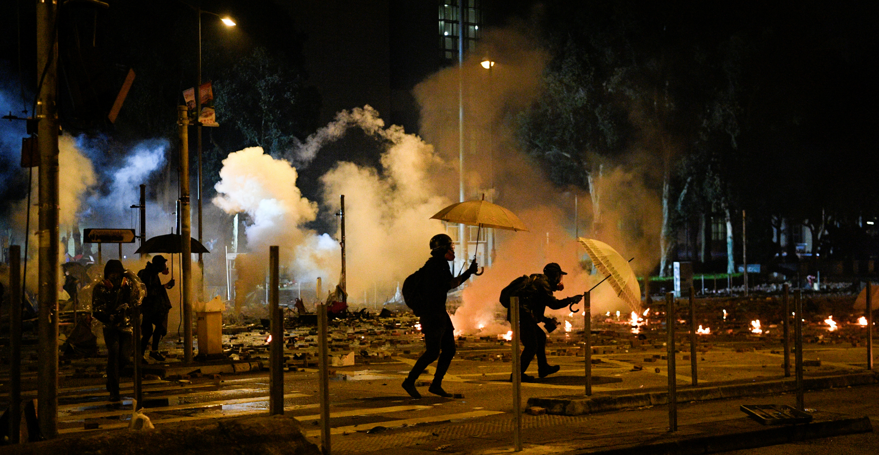 Protesters clash with police at the Polytechnic University in Hung Hom on Monday. Photo: Reuters Protesters clash with police at the Polytechnic University in Hung Hom on Monday. Photo: Reuters