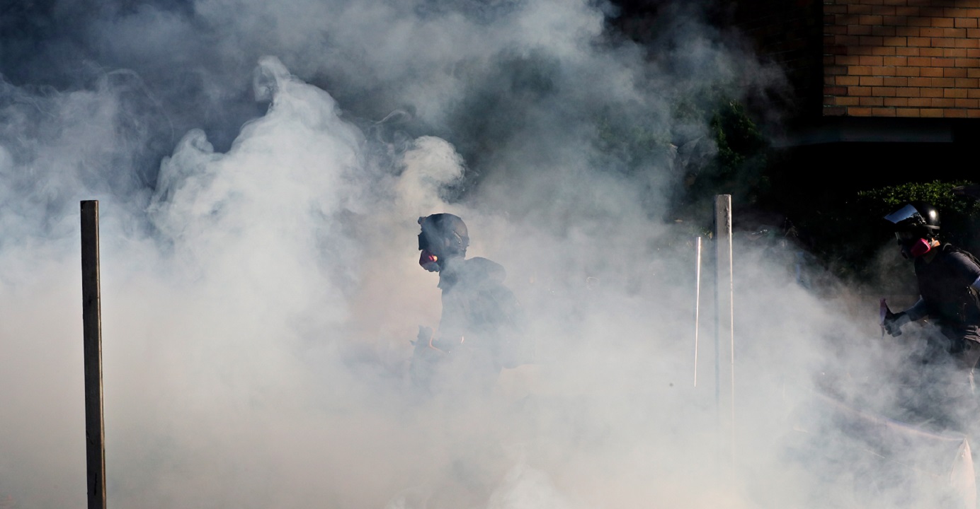 Protesters clash with police at the Hong Kong Polytechnic University on Monday. Police reiterated that they did not 'raid' the premises. Photo: Reuters Protesters clash with police at the Hong Kong Polytechnic University on Monday. Police reiterated that they did not 'raid' the premises. Photo: Reuters