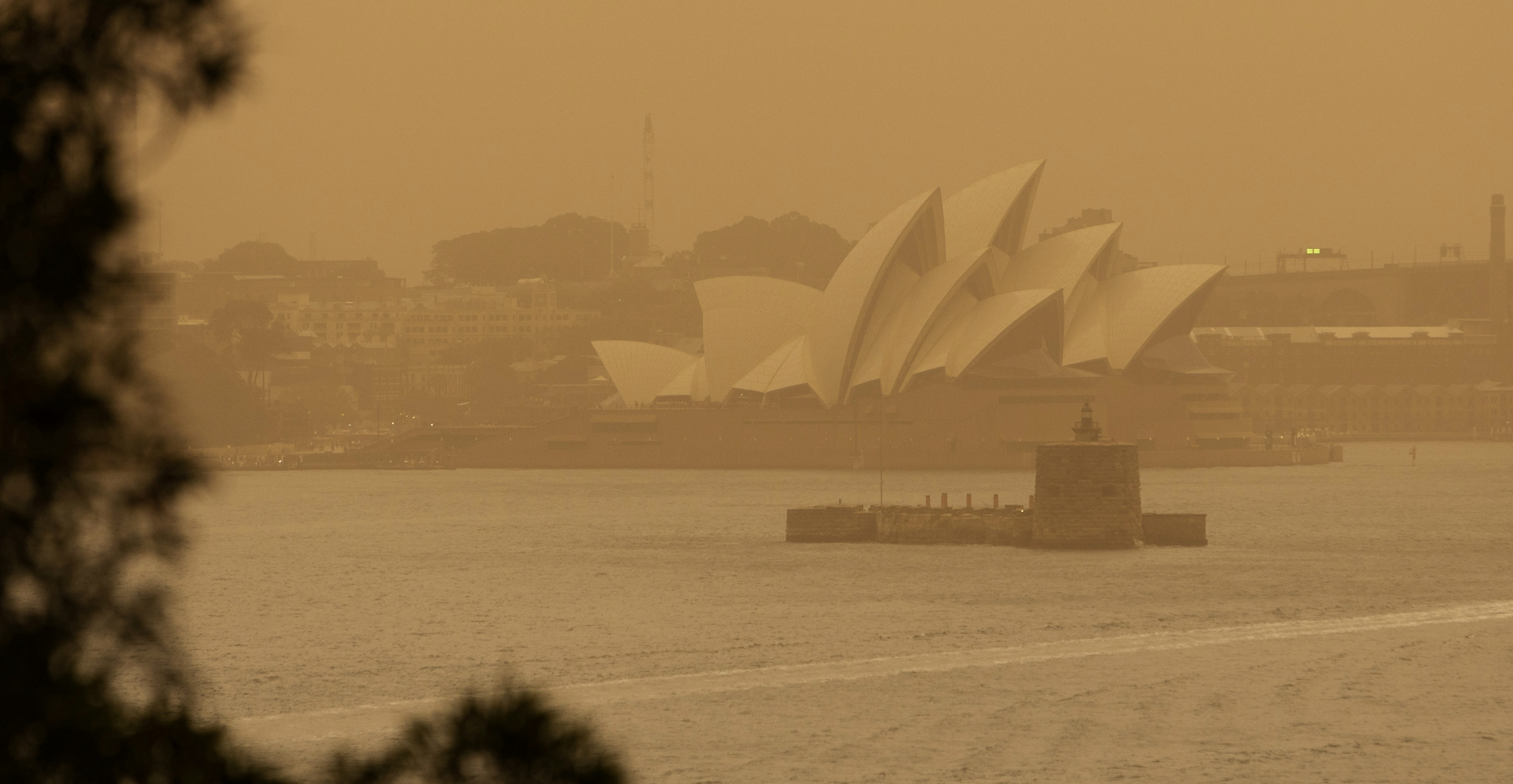 The bushfire smoke drifting over Sydney has prompted health authorities to advise people to stay inside as much as possible. Photo: AAP via Reuters The bushfire smoke drifting over Sydney has prompted health authorities to advise people to stay inside as much as possible. Photo: AAP via Reuters