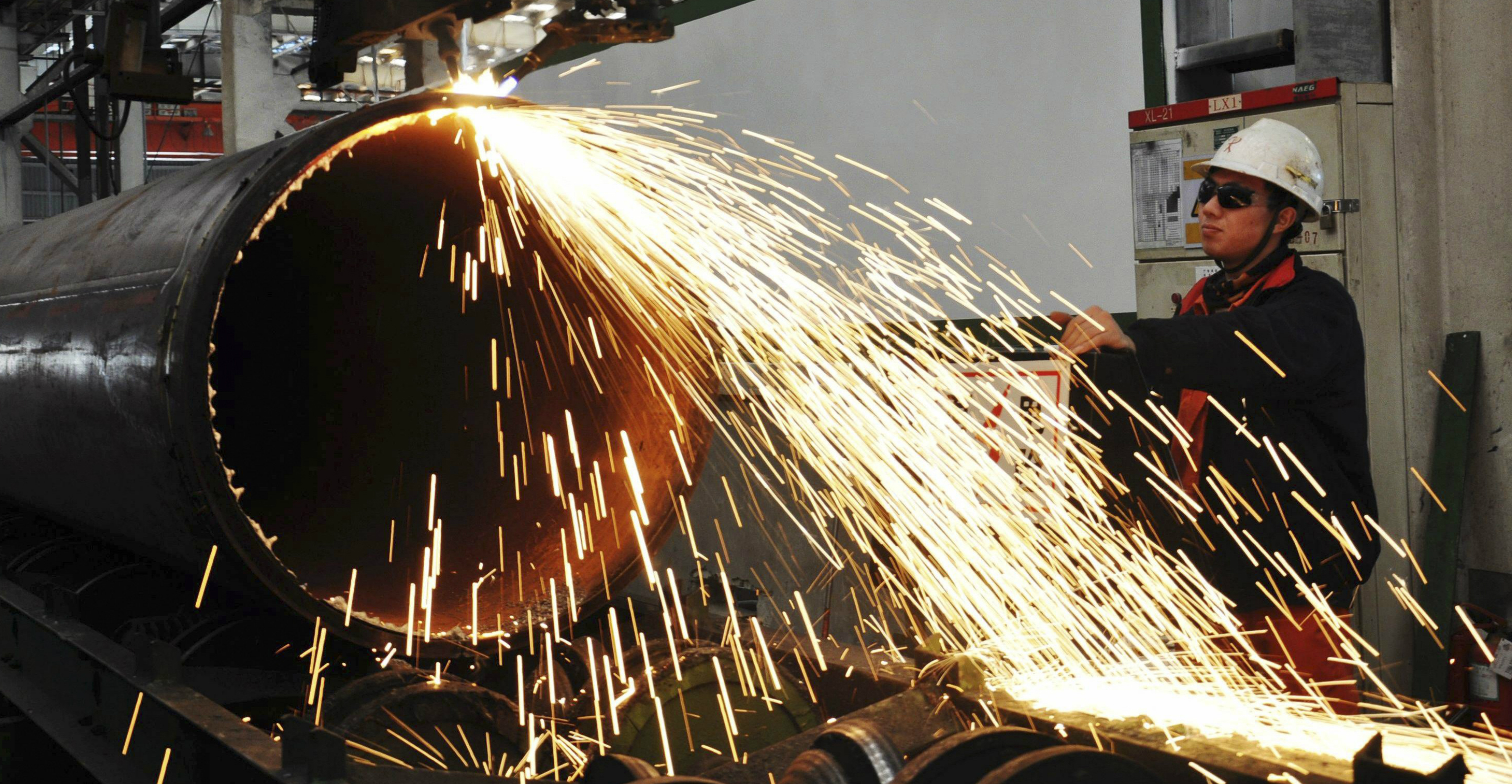 The Caixin survey showed total new orders and factory production remained at buoyant levels in November. Photo: Reuters The Caixin survey showed total new orders and factory production remained at buoyant levels in November. Photo: Reuters