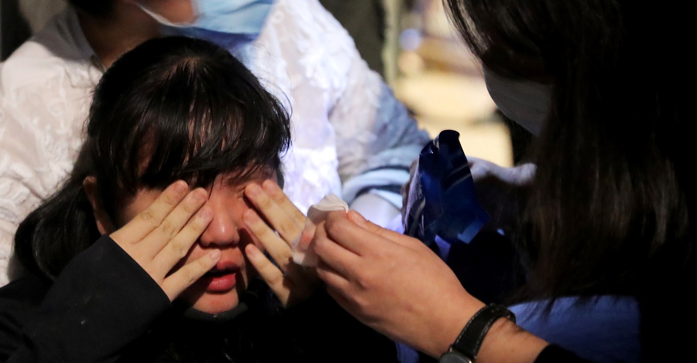 A woman was allegedly hit in the eye by a police pepper ball during a protest in the Mong Kok area on Saturday night. She was given first-aid treatment on the spot. Photo: Reuters A woman was allegedly hit in the eye by a police pepper ball during a protest in the Mong Kok area on Saturday night. She was given first-aid treatment on the spot. Photo: Reuters