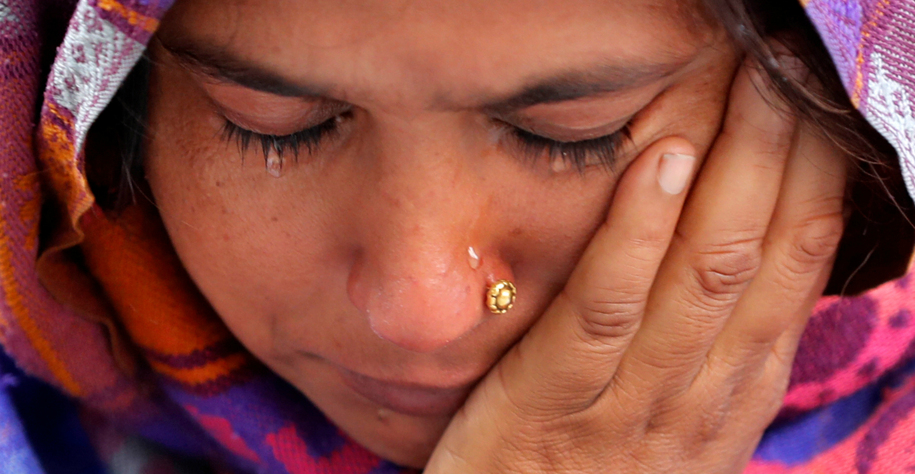 A woman weeps as she waits outside a mortuary to receive the body of a relative who died in the factory fire in New Delhi on Sunday. Photo: Reuters A woman weeps as she waits outside a mortuary to receive the body of a relative who died in the factory fire in New Delhi on Sunday. Photo: Reuters