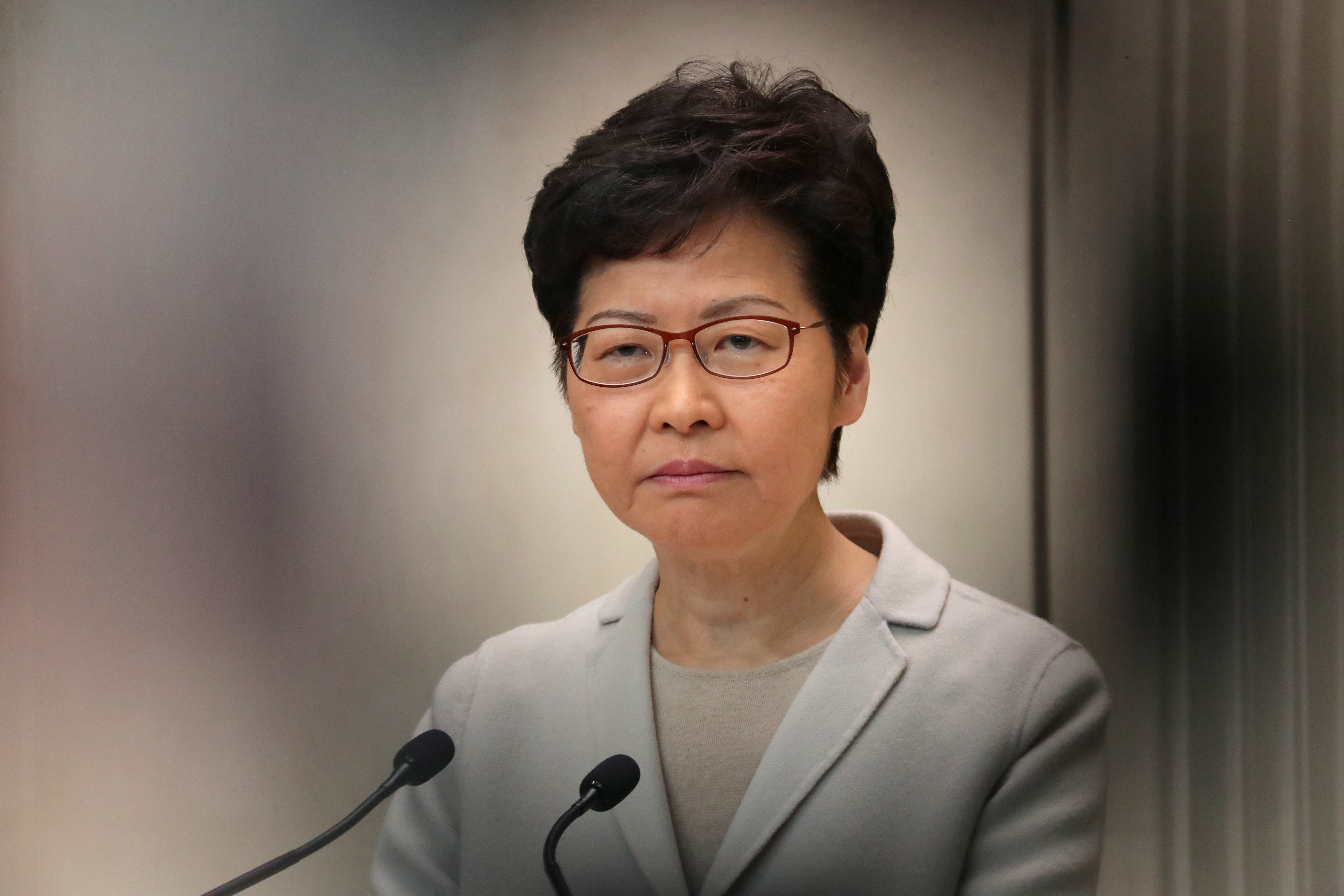 Carrie Lam speaks to the media on Nov. 26 after district council elections delivered a landslide for pro-democracy candidates. There is talk that Lam will reshuffle her cabinet as she seeks to soothe public anger and improve governance. Photo: Reuters Carrie Lam speaks to the media on Nov. 26 after district council elections delivered a landslide for pro-democracy candidates. There is talk that Lam will reshuffle her cabinet as she seeks to soothe public anger and improve governance. Photo: Reuters