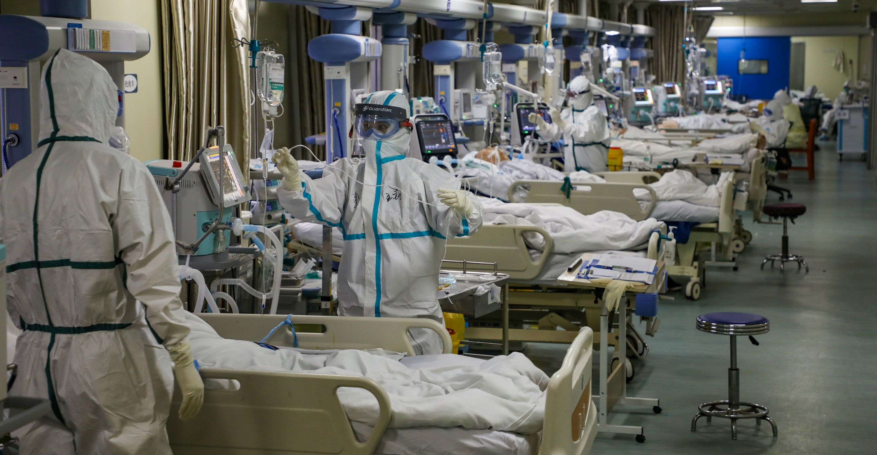 Medical workers in protective suits attend to novel coronavirus patients at the intensive care unit of a hospital in Wuhan, the capital of central China's Hubei province, last Thursday. Photo: China Daily via Reuters Medical workers in protective suits attend to novel coronavirus patients at the intensive care unit of a hospital in Wuhan, the capital of central China's Hubei province, last Thursday. Photo: China Daily via Reuters