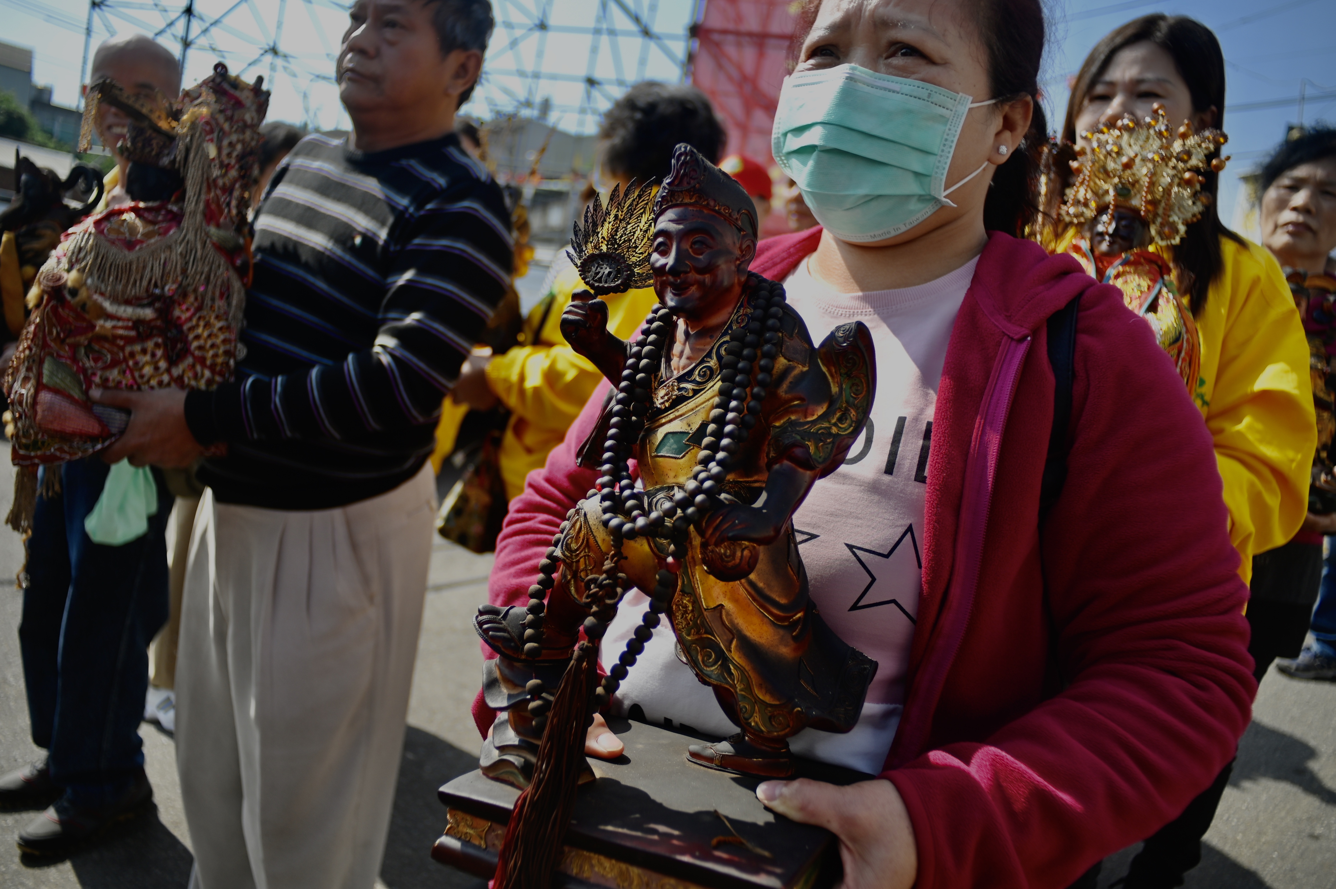 People wearing protective masks gather at the Taoist Longde temple during a ceremony to prevent the spread of the novel coronavirus, in Taoyuan, northwestern Taiwan on Saturday. Photo: AFP People wearing protective masks gather at the Taoist Longde temple during a ceremony to prevent the spread of the novel coronavirus, in Taoyuan, northwestern Taiwan on Saturday. Photo: AFP