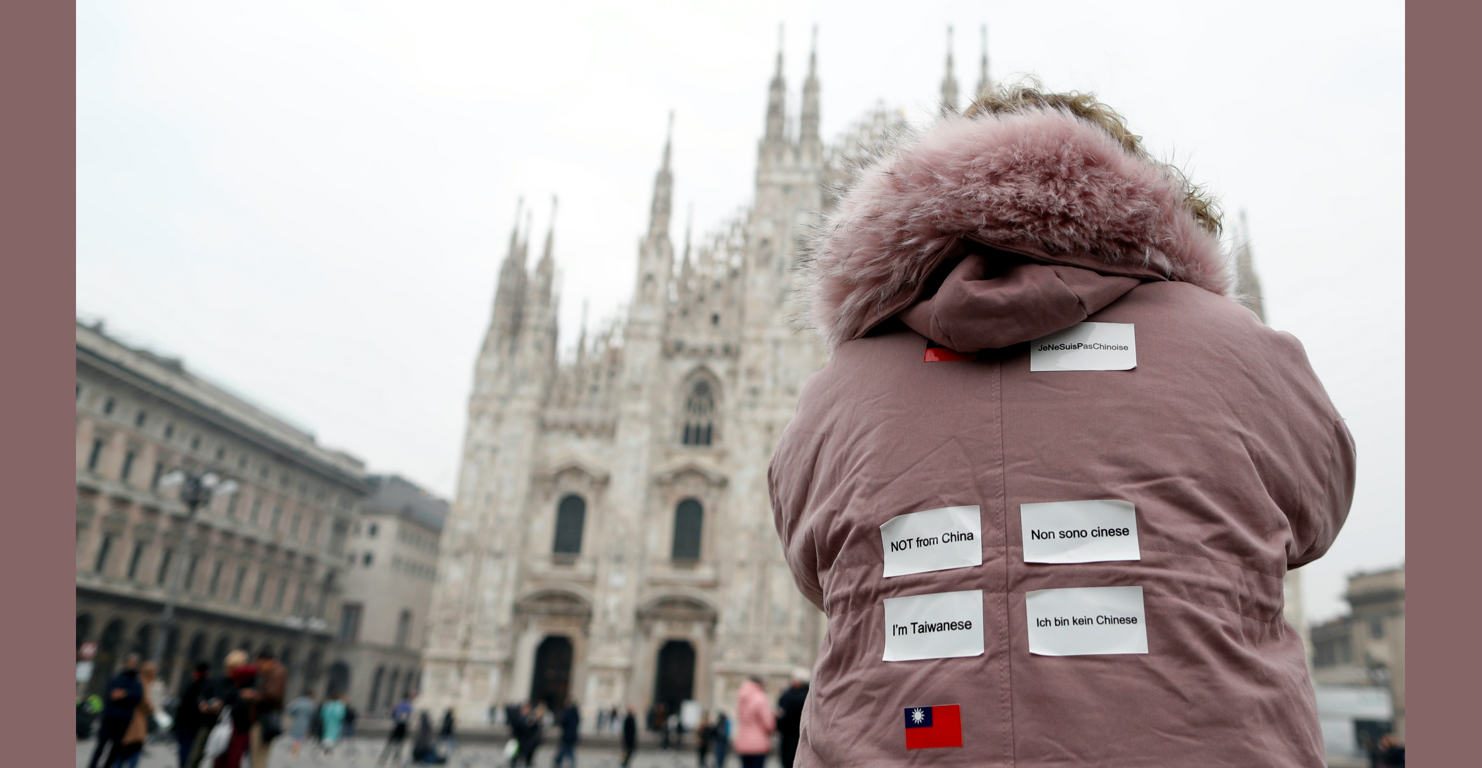 A tourist from Taiwan wears stickers on her back in Milan amid reports that some Italians are blaming Chinese for the coronavirus outbreak in the European country. Photo: Reuters A tourist from Taiwan wears stickers on her back in Milan amid reports that some Italians are blaming Chinese for the coronavirus outbreak in the European country. Photo: Reuters