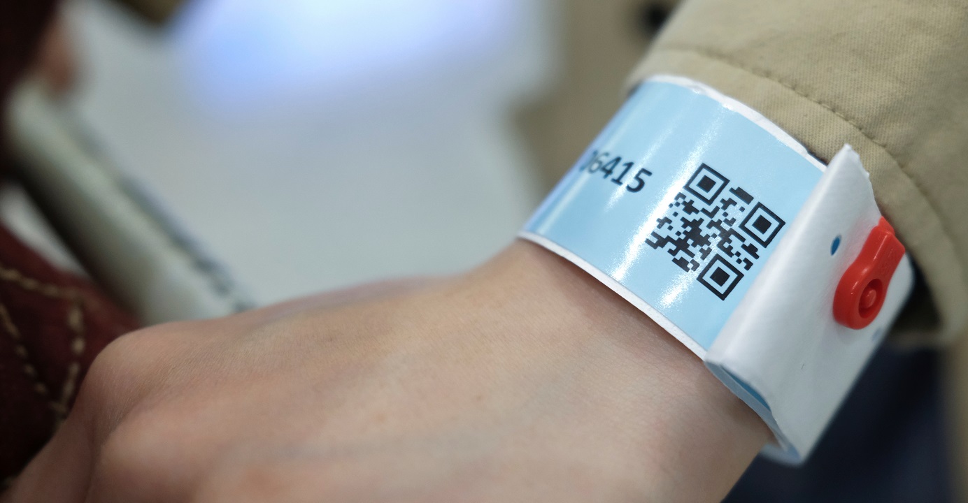 A passenger is made to wear an electronic wristband upon arrival at Hong Kong International Airport as a means to monitor their location amid the coronavirus outbreak. Photo: Reuters A passenger is made to wear an electronic wristband upon arrival at Hong Kong International Airport as a means to monitor their location amid the coronavirus outbreak. Photo: Reuters