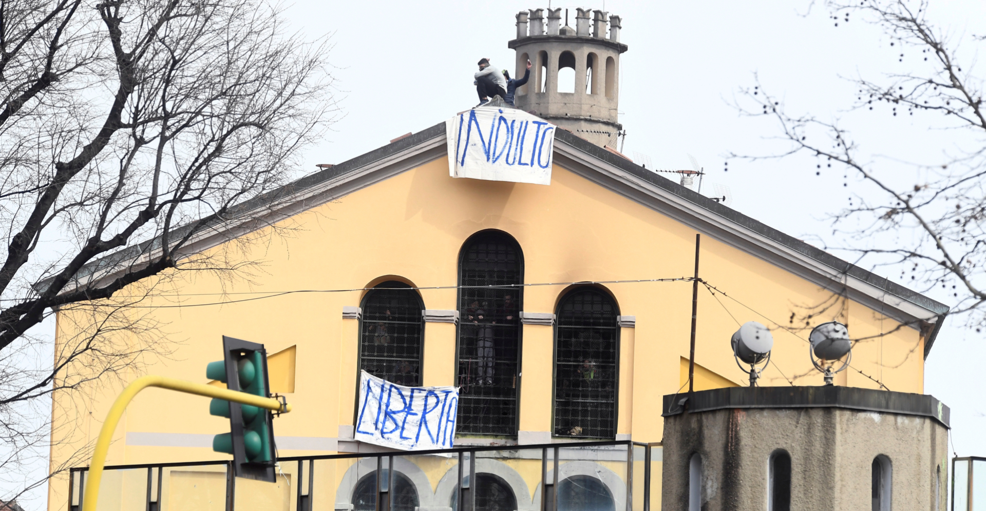 Inmates of San Vittore Prison take part in a revolt after family visits were suspended due to fears over coronavirus contagion, in Milan, Italy on March 9. Photo: Reuters Inmates of San Vittore Prison take part in a revolt after family visits were suspended due to fears over coronavirus contagion, in Milan, Italy on March 9. Photo: Reuters