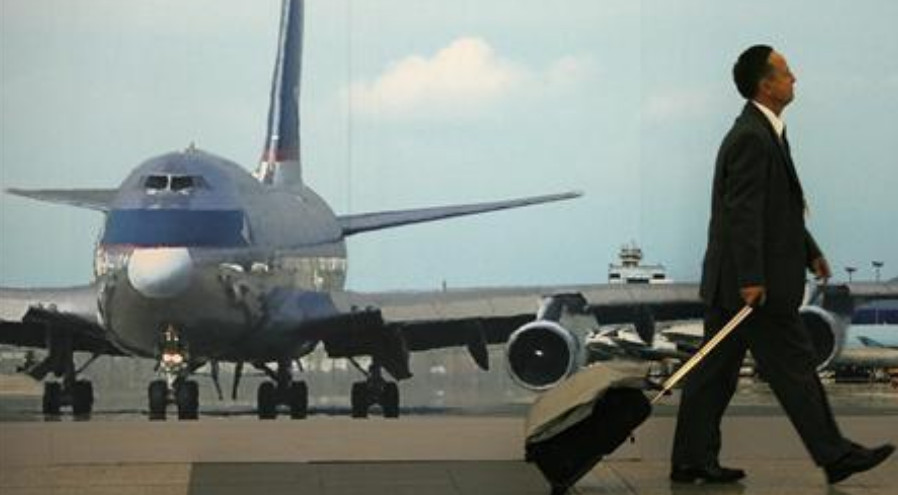 Business travel is a large expense for many firms. Photo: Reuters Business travel is a large expense for many firms. Photo: Reuters