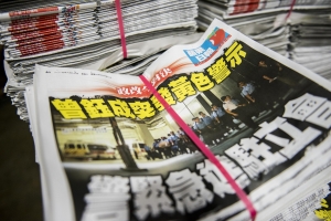 One Apple is firing reporters, another is recruiting them