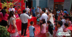 What's a Chinese groom to do with the high cost of a wedding?