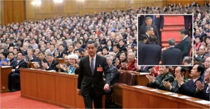 What does Xi Jinping's handshake with CY Leung mean?