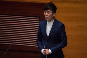 Localist lawmaker charged with flag desecration